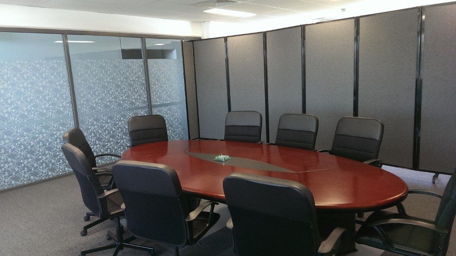 Gray Office Partition used to create meeting room with boardroom table - Portable Partitions