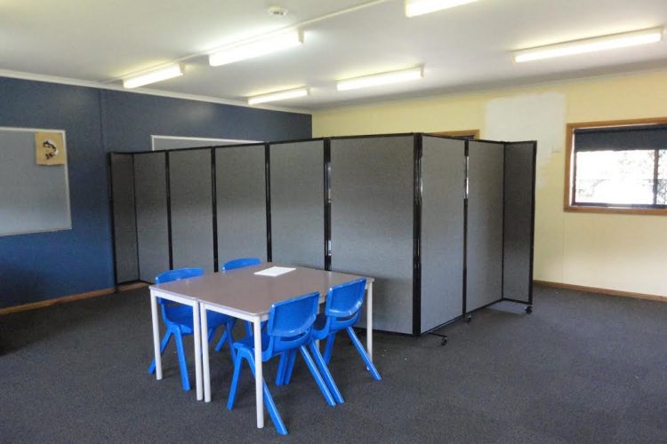 Kindergarten Class with small table and chairs infront of corner breakout area made from partition - Portable Partitions