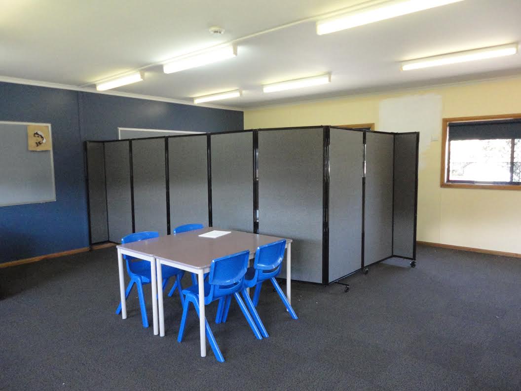 Kindergarten Class with small table and chairs infront of corner breakout area made from partition - Portable Partitions