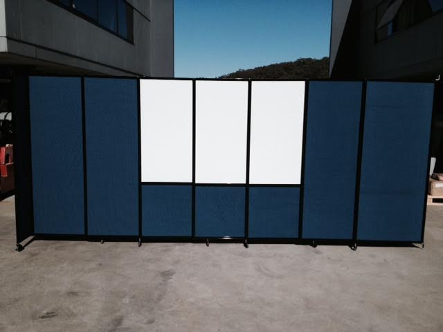 blue temporary wall with custom whiteboard - Portable Partitions 