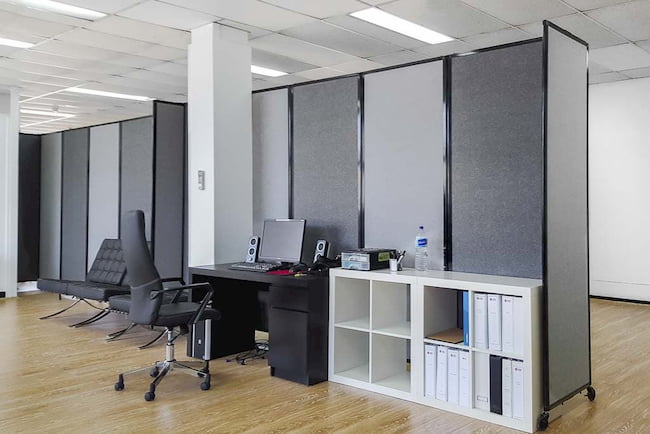 Two connected Charcoal and Grey 360 Degree Portable Room Divider in office